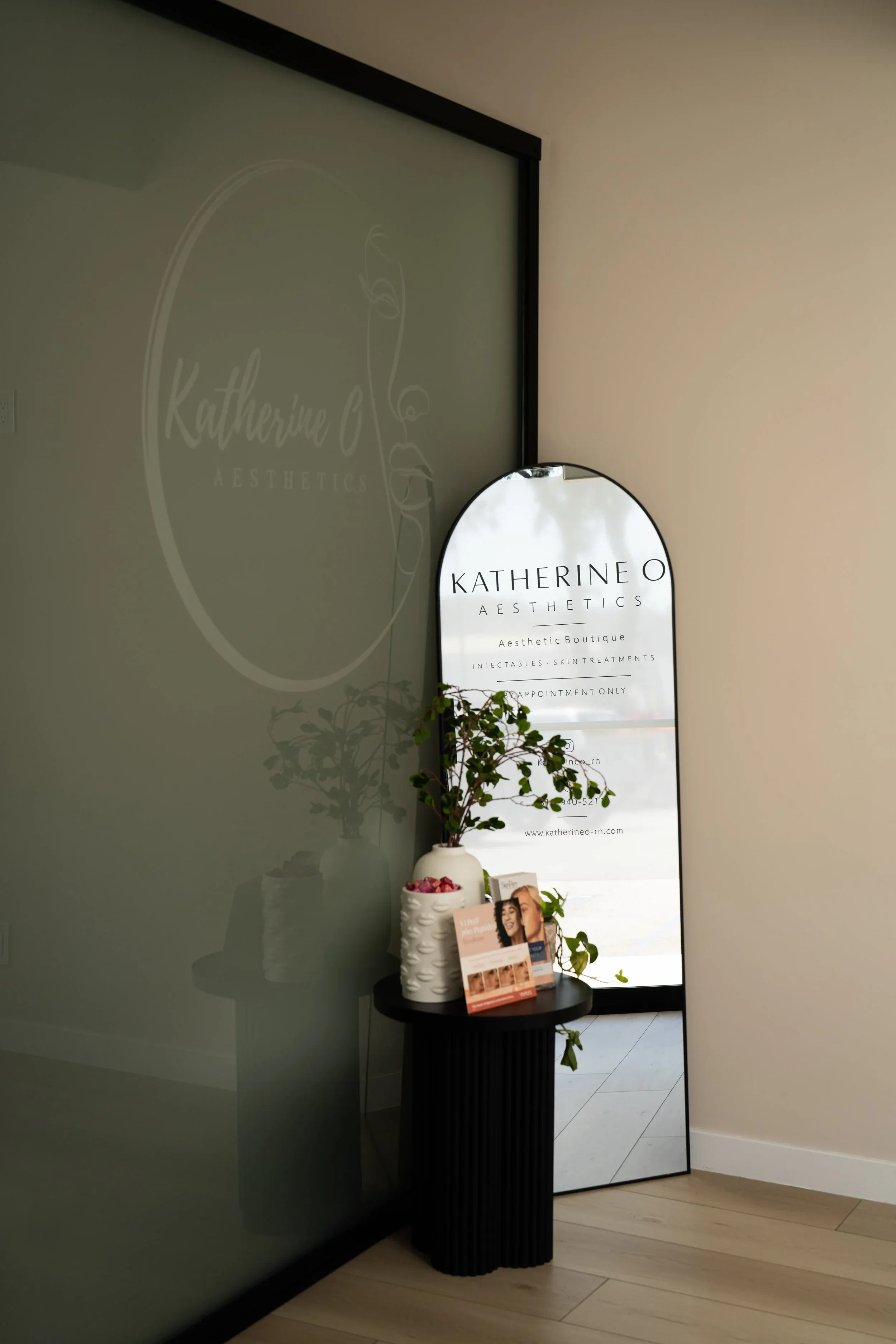 Entry of the Katherine O Aesthetics studio with its arched welcome sign